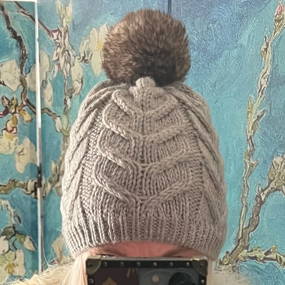 Gap OSFA grey cable knit snow cap with faux fur pom pom’s.